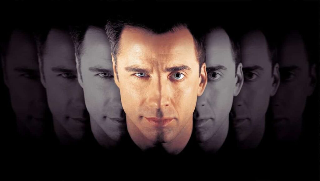 John Travolta e Nicolas Cage no cartaz de A Outra Face Foto