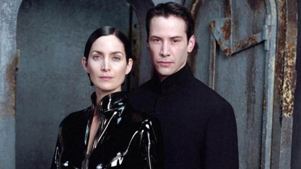 Carrie Anne Mossa e Keanu Reeves em Matrix Reproducao