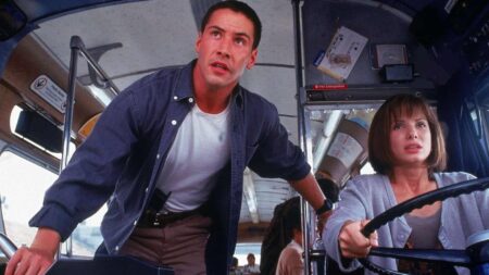 Keanu Reeves e Sandra Bullock em Velocidade Maxima Reproducao