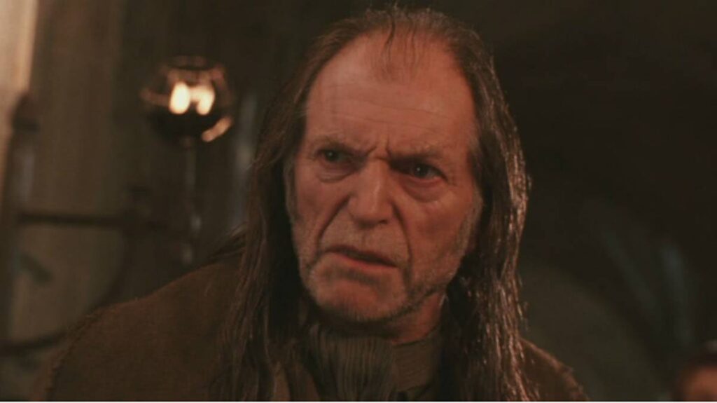 5 vilões secundários que você não percebeu em Harry Potter Argus Filch (David Bradley) em Harry Potter (Reprodução)