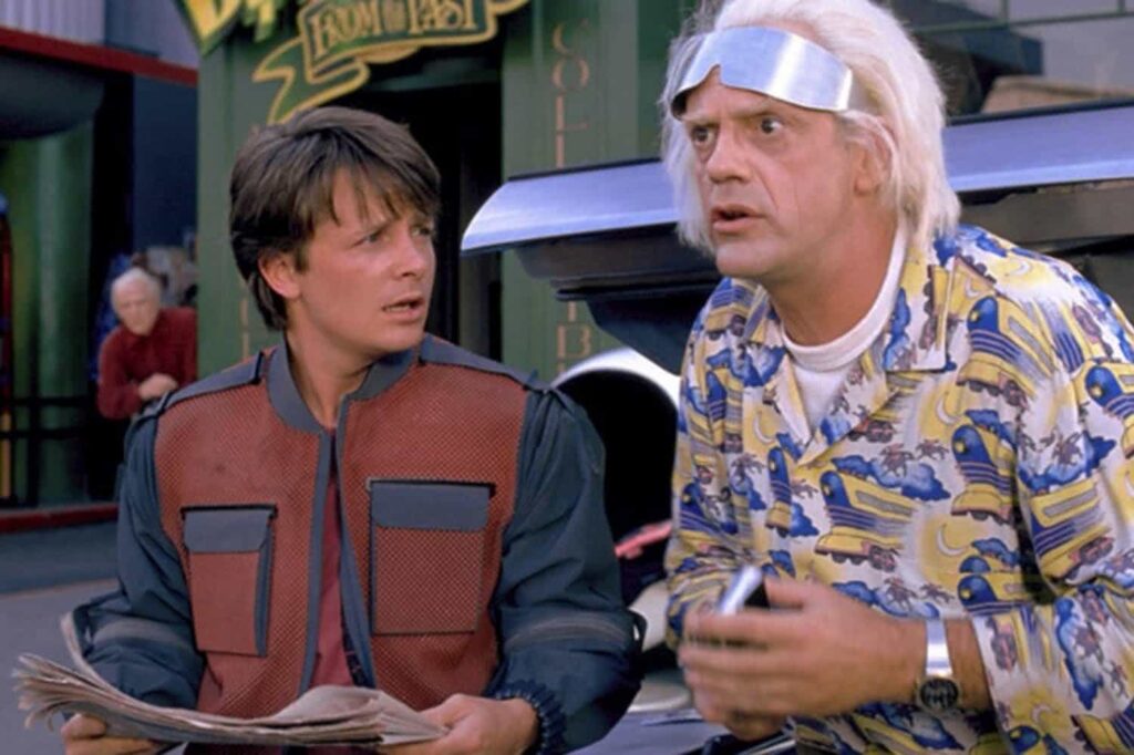 O que Michael J. Fox acha de reboot de De Volta Para O Futuro? Michael J. Fox e Christopher Lloyd em De Volta para o Futuro (Reprodução)