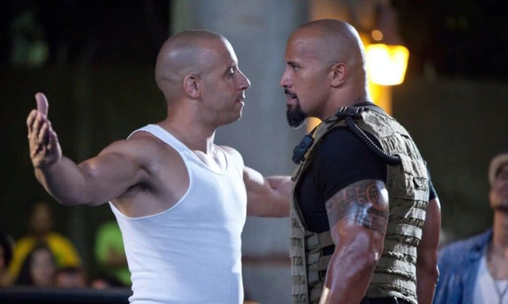 Confira as maiores alfinetadas que os atores soltaram este ano Vin Diesel e The Rock na franquia Velozes e Furiosos (Reprodução / Universal)