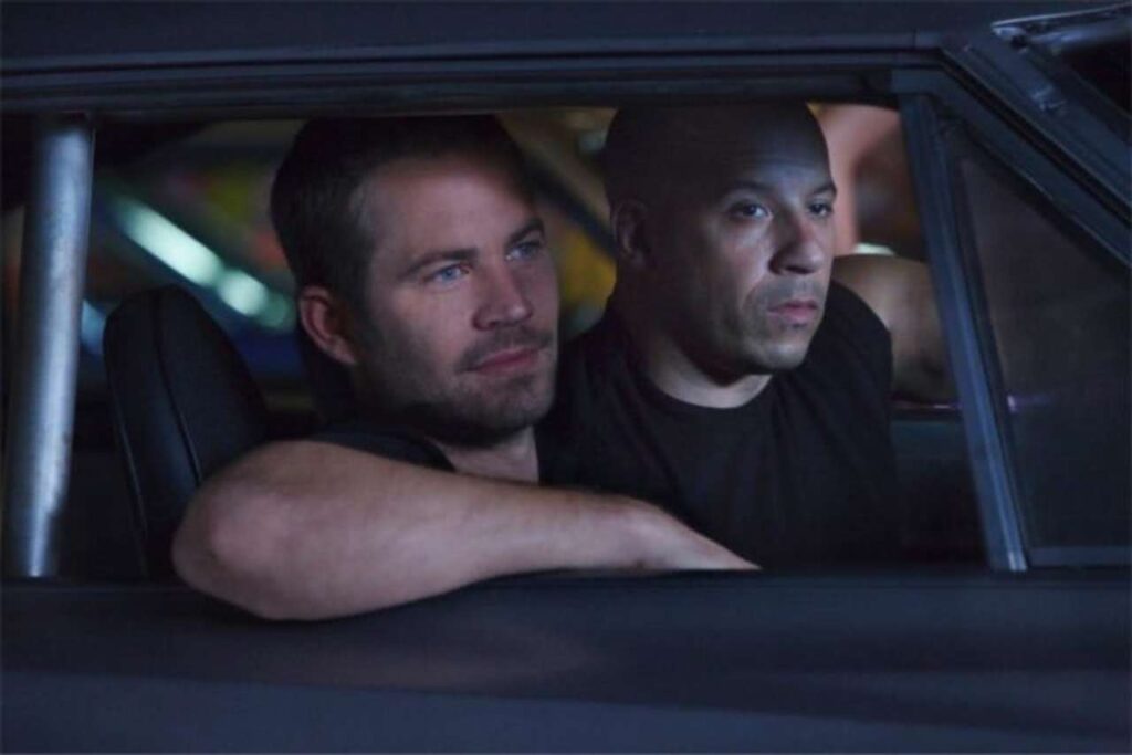Filha do finado Paul Walker pode entrar em Velozes e Furiosos? Vin Diesel e Paul Walker em Velozes em Furiosos (Reprodução)
