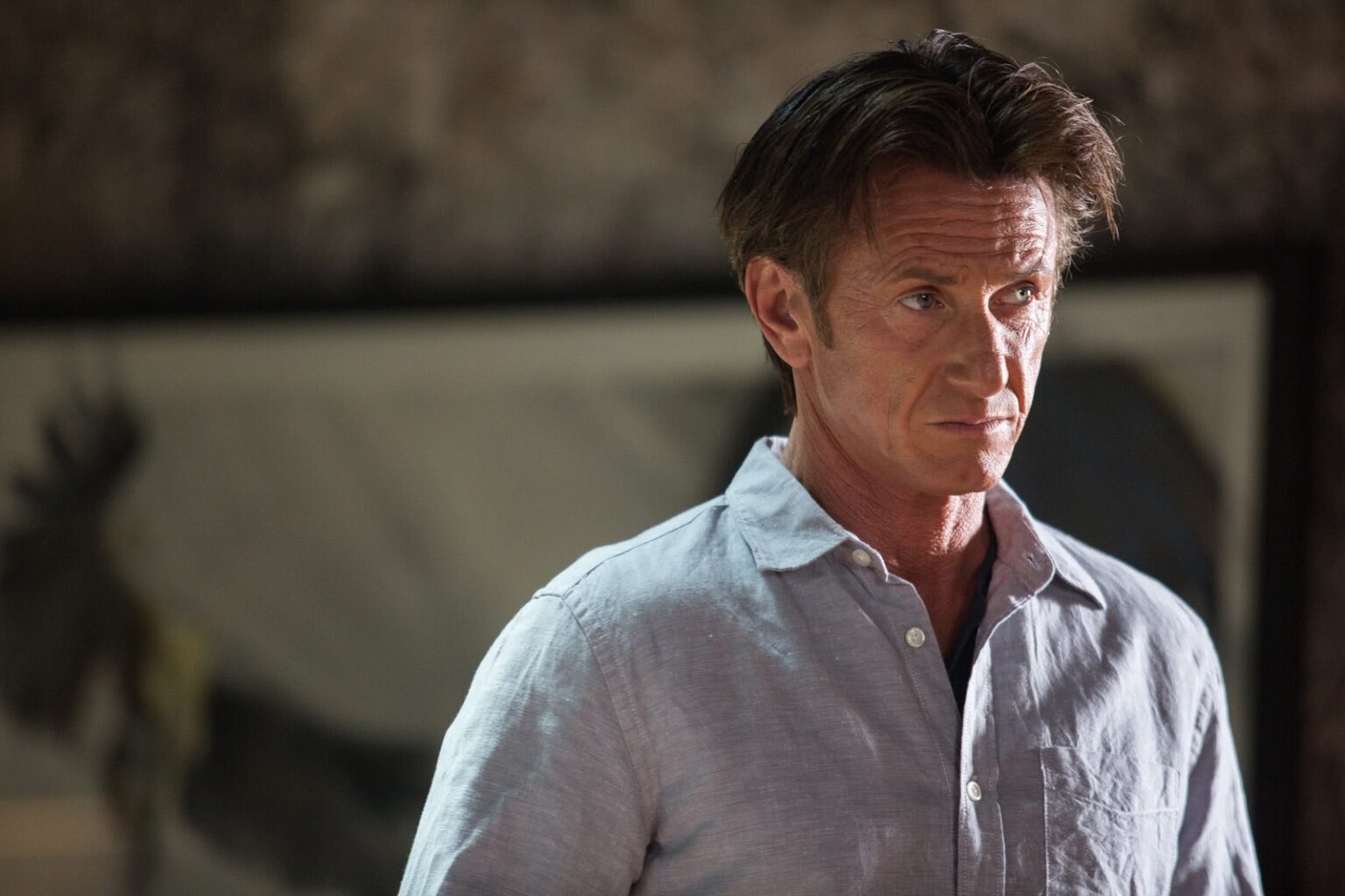 Divorciado, Sean Penn diz que é apaixonado por ex-mulher Sean Penn em Franco Atirador Reproducao
