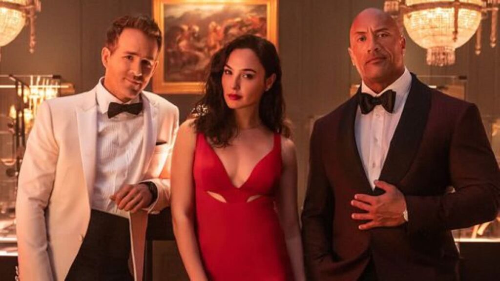 Round 6 de Hollywood, Alerta Vermelho pode virar filme mais assistido da Netflix Ryan Reynolds, Gal Gadot e Dwayne Johnson em Alerta Vermelho (Divulgação)