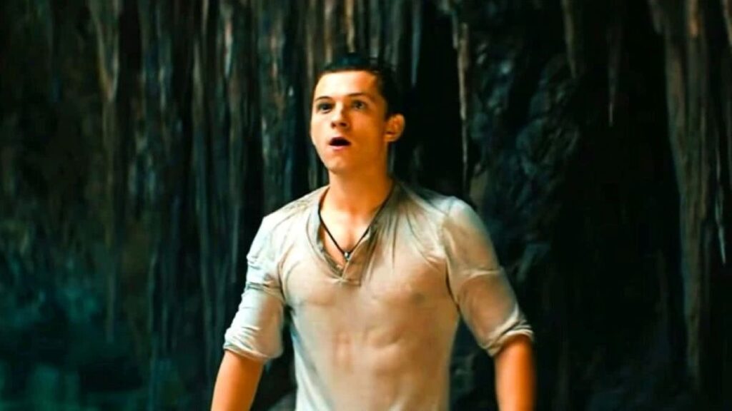 Uncharted: Sony prevê lucro de 360 milhões em fim de semana de estreia Tom Holland como Nathan Drake em Uncharted: Fora do Mapa (Reprodução)