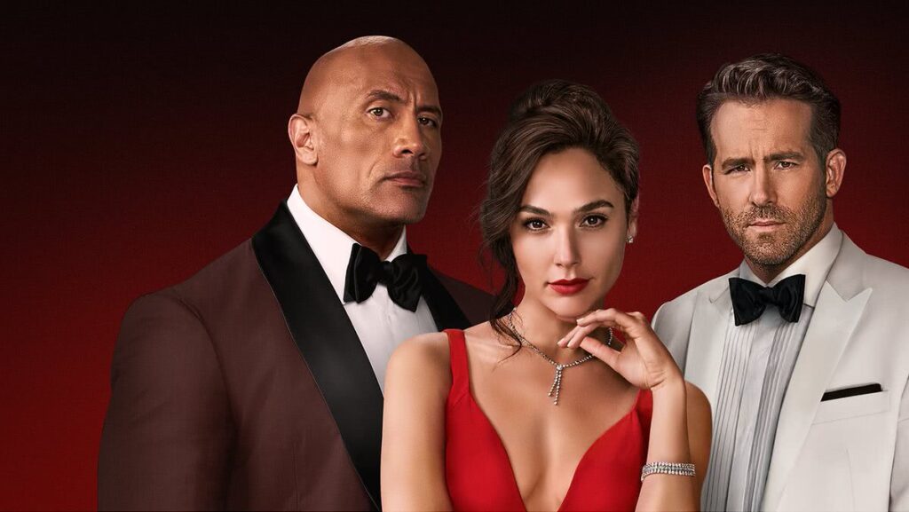 Dwayne Johnson faz post se achando sobre filme: “O maior” Dwayne Johnson, Gal Gadot e Ryan Reynolds em Alerta Vermelho (Divulgação / Netflix)