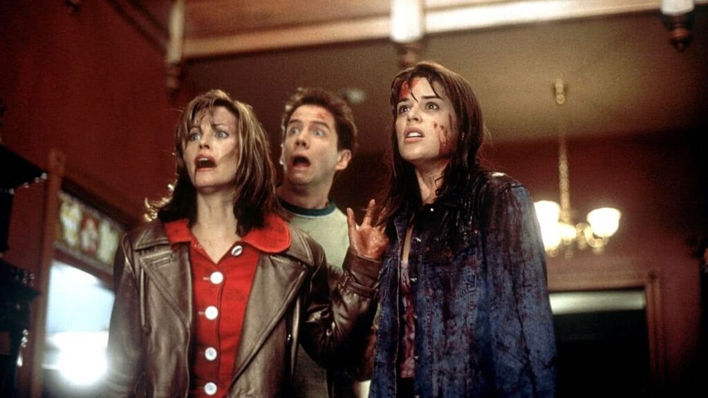 Courteney Cox, Jamie Kannedy e Neve Campbell em Pânico (Reprodução)