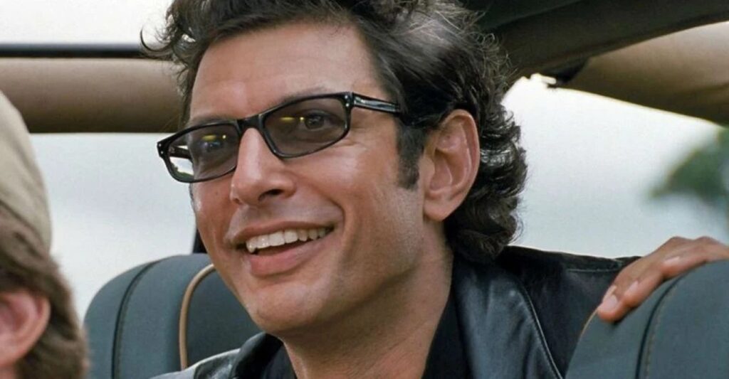 Steven Spielberg quase cortou Ian Malcolm de Jurassic Park Jeff Goldblum como Ian Malcolm em Jurassic Park (Reprodução)