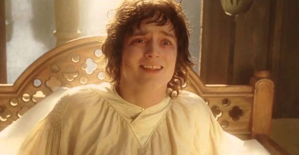 Elijah Wood como Frodo em O Senhor dos Anéis (Reprodução)