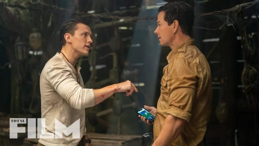 Nathan e Sully discutem em uma nova imagem do filme Uncharted Nathan Drake (Tom Holland) e Sully (Mark Wahlberg) em Uncharted: Fora do Mapa (Divulgação)