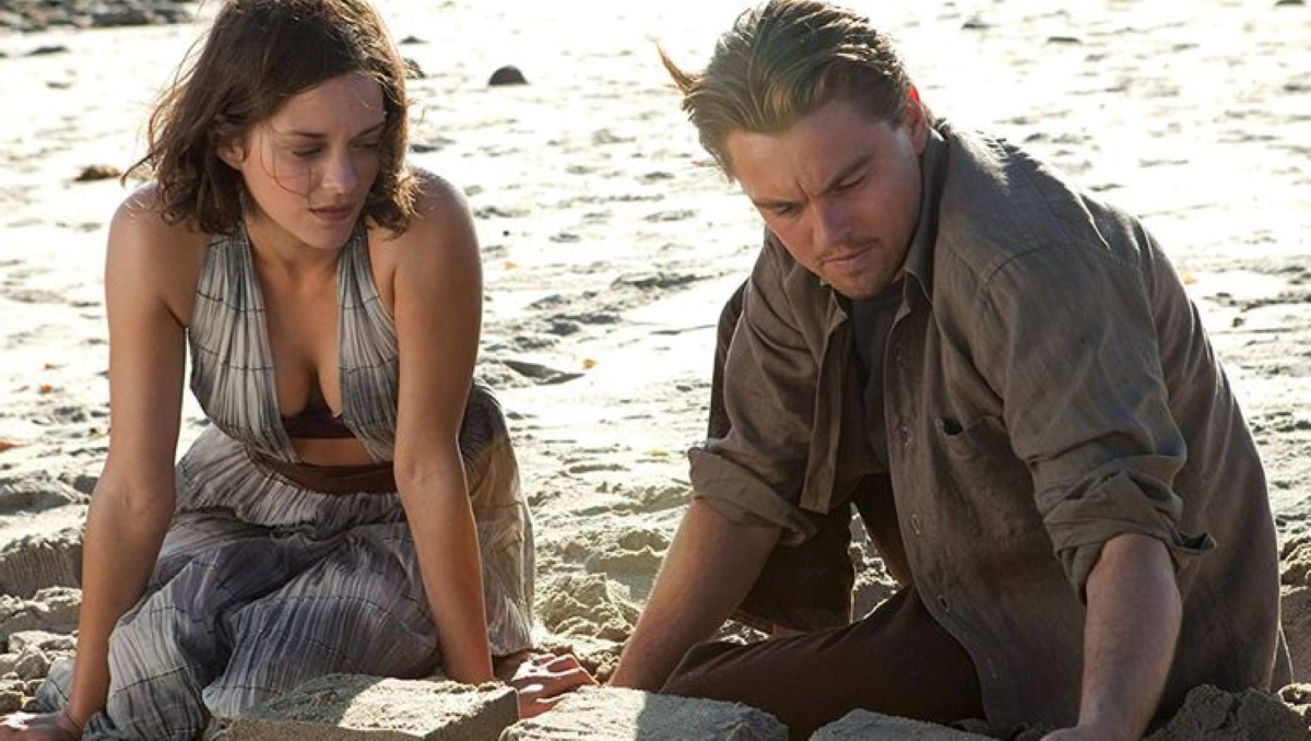 Os personagens programáveis dos filmes de Christopher Nolan 3 Dom Cobb (Leonardo DiCaprio) e Mal (Marion Cotillard) em A Origem (Reprodução)