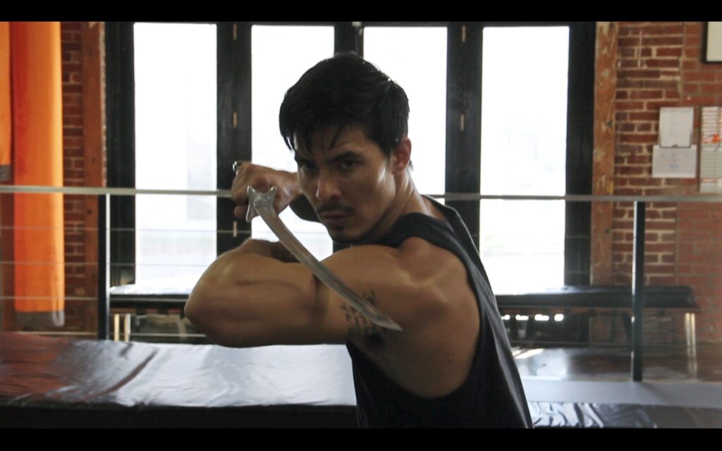 Cole Young (Lewis Tan) em Mortal