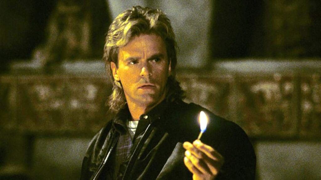 Ator de série original teve bom motivo para não participar de reboot de MacGyver Richard Dean Anderson em cena de MacGyver Reproducao