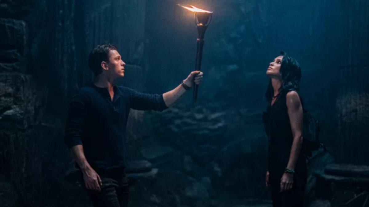 Chloe Frazer Sophia Ali e Nathan Drake Tom Holland em cena de Uncharted Reproducao