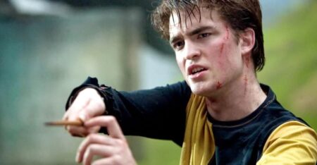 Harry Potter Goblet of Fire Robert Pattinson holding wand