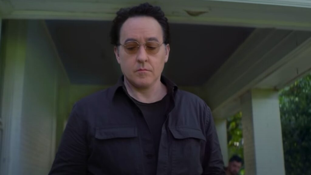 Brian Skiba é só elogios para o elenco de Pursuit John Cusack em Pursuit (Reprodução)