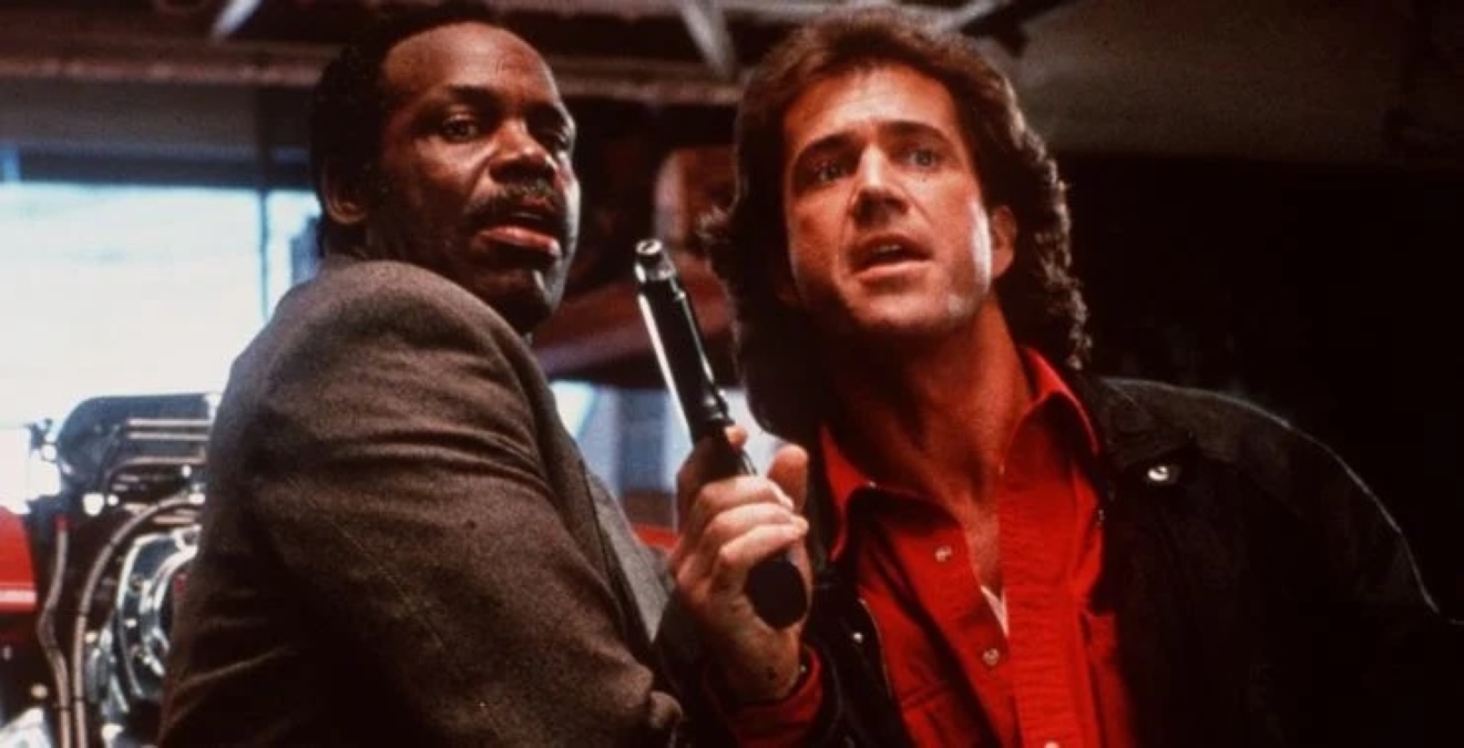 Danny Glover e Mel Gibson em Máquina Mortífera (Reprodução)