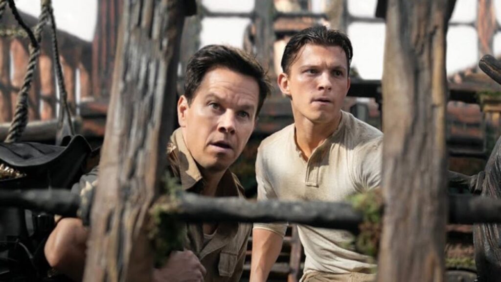 Mark Wahklberg e Tom Holland em Uncharted: Fora do Mapa (Reprodução)