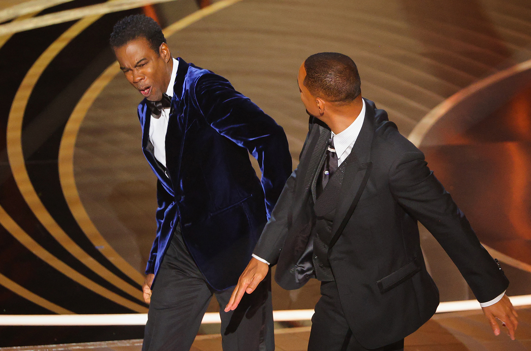 Will Smith attacks Chris Rock at the 2022 Oscars