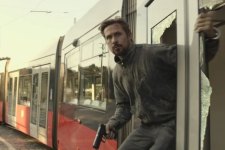 Ryan Gosling em Agente Oculto (Reprodução / Netflix)