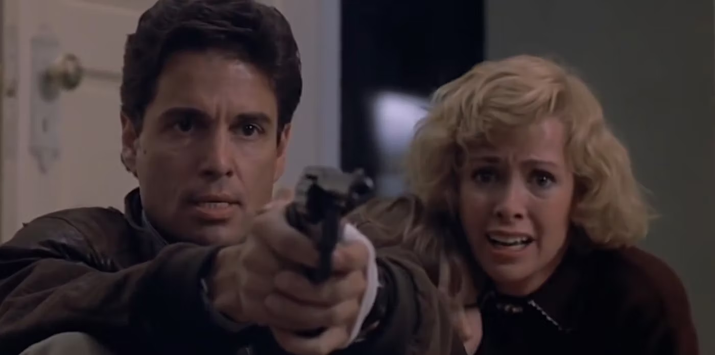 Chris Sarandon é Mike Norris e Catherine Hicks é Karen Barclay em Brinquedo Assassino (Reprodução)