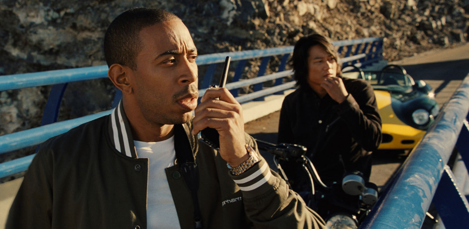 Chris "Ludacris" Bridges como Tej Parker e Sung Kang como Han Lue em Velozes e Furiosos 6 