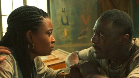 Idris Elba não conseguiu escalar a própria filha em A Fera Meredith (Iyana Halley) e Dr. Nate Samuels (Idris Elba) em A Fera (Reprodução)