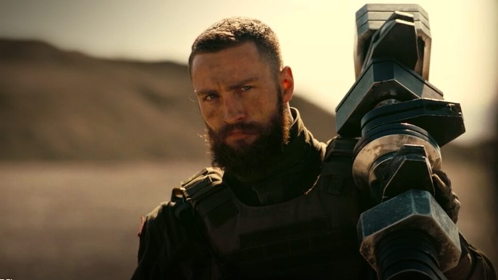 Ator da Marvel passou por processo doloroso para conseguir papel em filme de Christopher Nolan Ives (Aaron Taylor-Johnson) em Tenet (Reprodução)