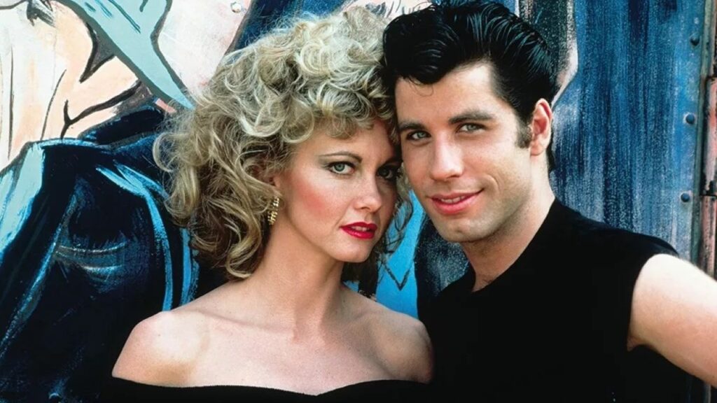 Olivia Newton-John quase não aceitou participar de Grease Olivia Newton-John e John Travolta em Grease: Nos Tempos da Brilhantina (Reprodução)