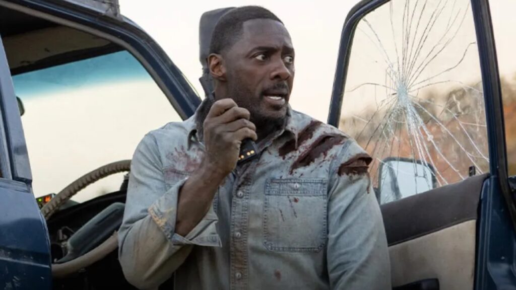 Filme A Fera levou um leão de verdade para o set? Idris Elba como Dr. Nate Samuels em A Fera (Reprodução)