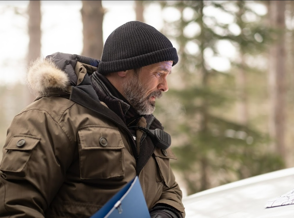 Billy Campbell como John Cardinal