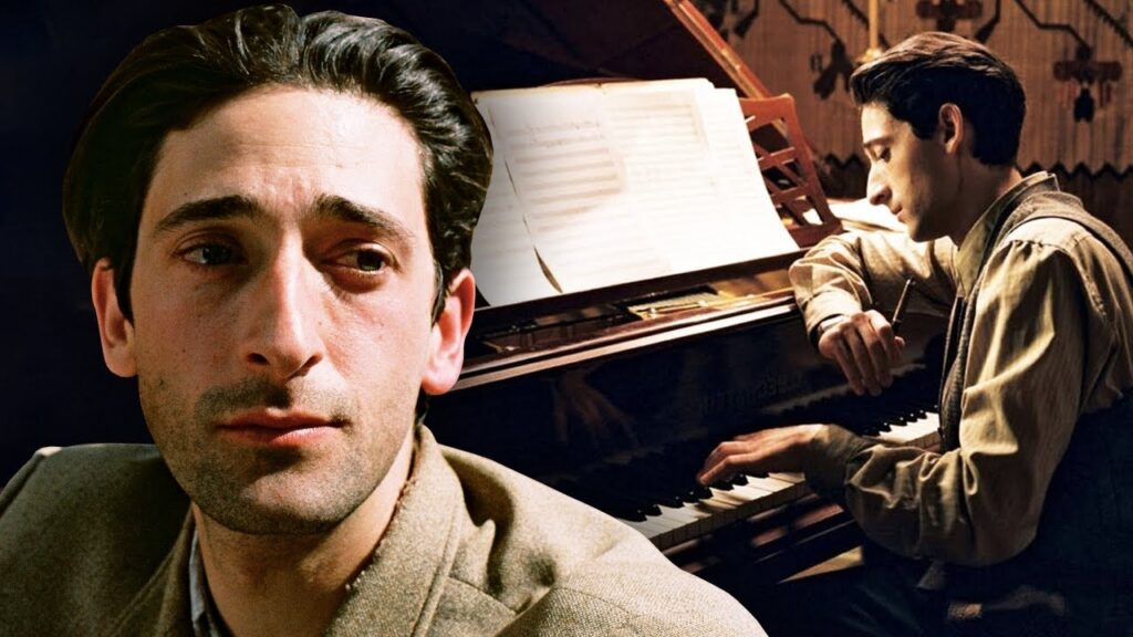 Ator precisou tocar piano por horas para filme, mas teve cenas dubladas Adrien Brody como Władysław Szpilman em O Pianista