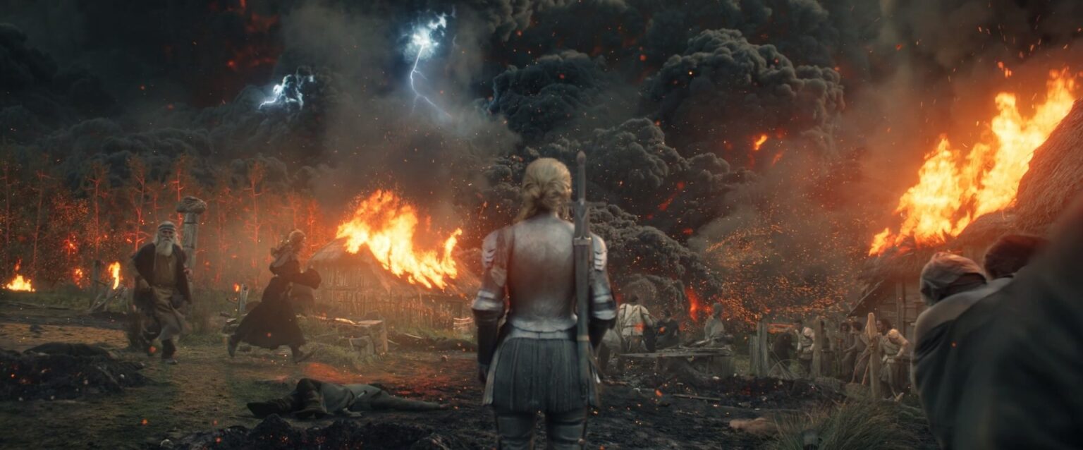 Galadriel (Morfydd Clark) vê a devastação das Terras do Sul em O Senhor dos Anéis: Os Anéis de Poder (Reprodução / Prime Video)