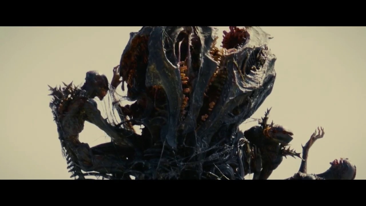 Criaturas humanoides saem da cauda de Godzilla em Shin Godzilla (Reprodução / Toho)