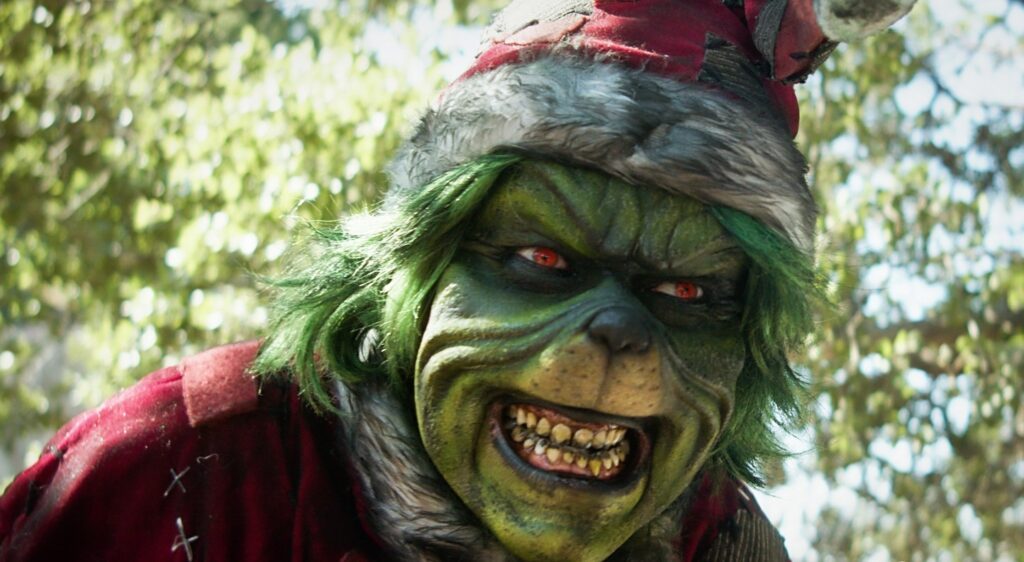 Como The Mean One teve permissão de criar um Grinch assassino? David Howard thornton como o Grinch assassino em The Mean One (Reprodução)