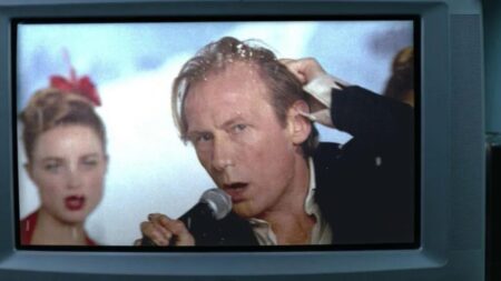 Bill Nighy como Billy Mack em Simplesmente Amor