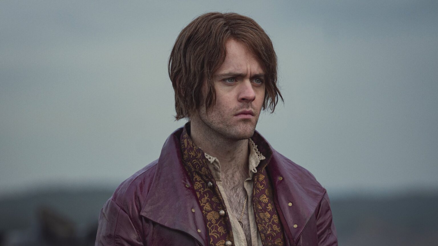 Joey Batey como Jaskier em The Witcher