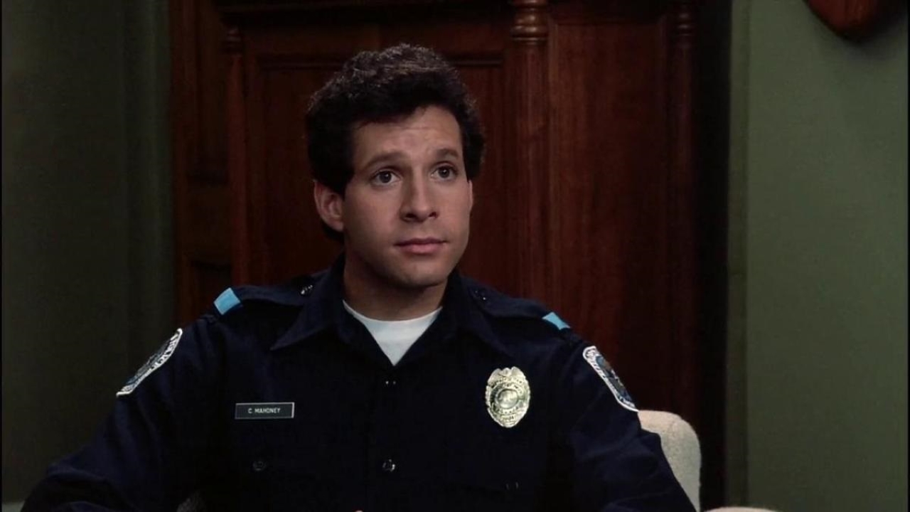 Steve Guttenberg as Sergeant Carey Mahoney in the police academy 