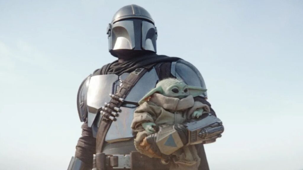 Din Djarin (Pedro Pascal) e Grogu em The Mandalorian (Reprodução / Disney+)