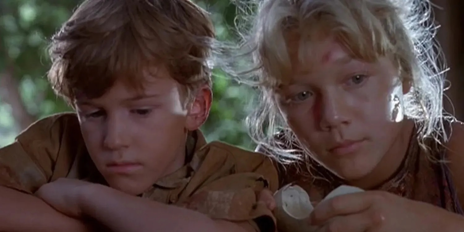 Tim (Josephs Mazzello) e Lex (Ariana Richards) curiosos em cena de Jurassic Park (Reprodução / Universal Pictures)