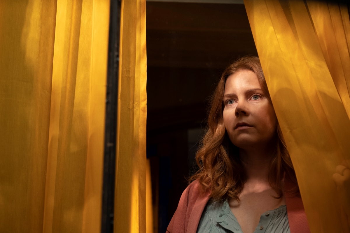 Cinco filmes de mistério para ver na Netflix 4 Amy Adams como Anna Fox em A Mulher na Janela (Divulgação / Netflix)