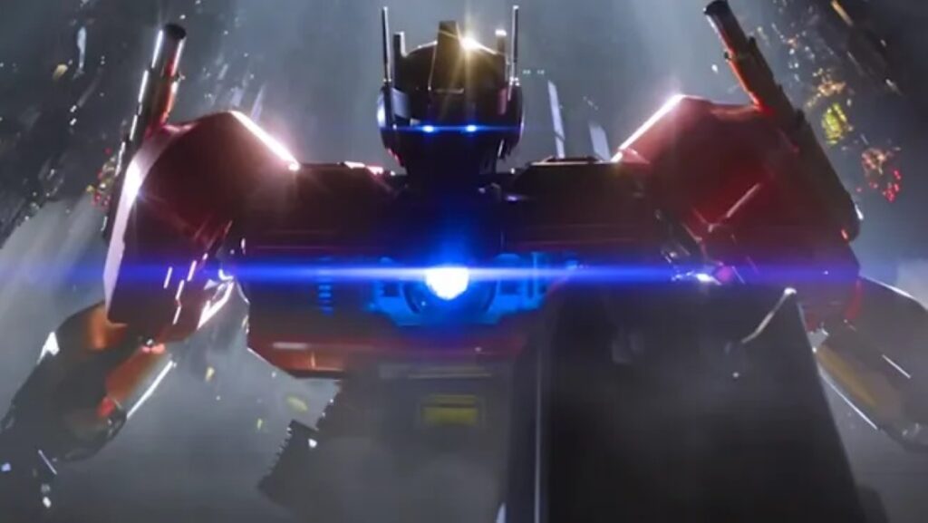 Diretor aborda como Transformers: O Início se aproxima dos live-actions Cena de Transformers: O Início (Reprodução)