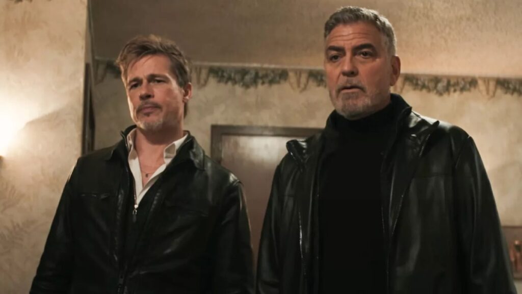 George Clooney e Brad Pitt são encarregados de limpar crimes em Lobos Brad Pitt e George Clooney em cena de Lobos (Reprodução / Sony Pictures)
