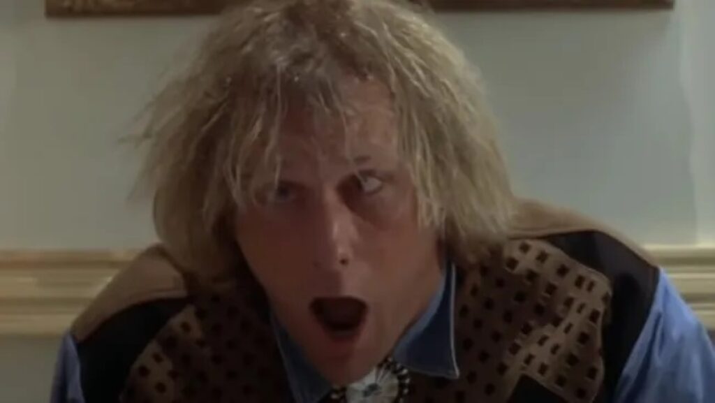 Jeff Daniels como Harry Dunne em Débi & Loide (Reprodução)