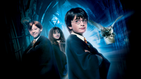Rupert Grint, Emma Watson e Daniel Raddiclife em Harry Potter e a Pedra Filosofal