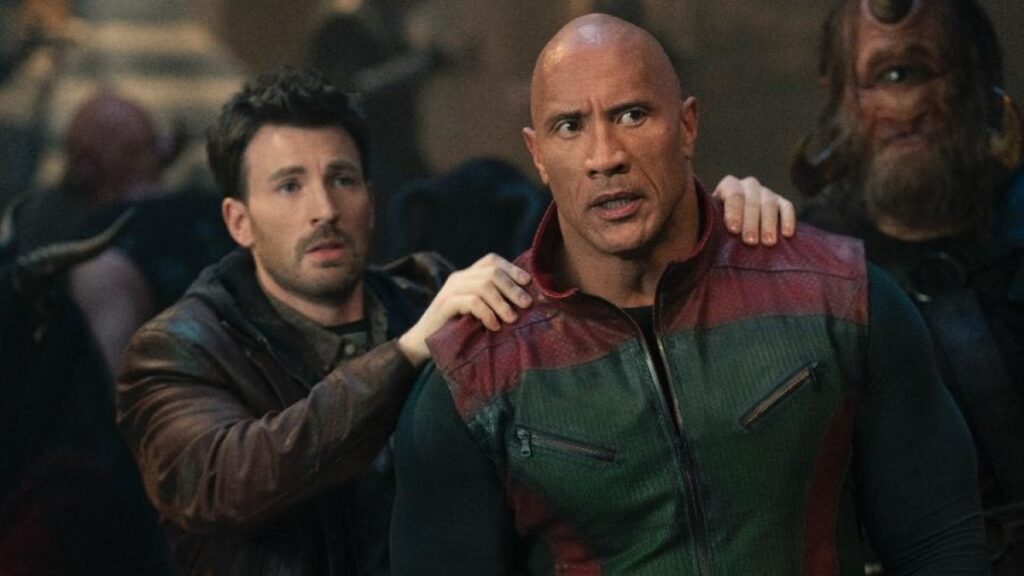 Dwayne Johnson aborda controvérsia no set de Operação Natal Chris Evans e Dwayne Johnson em Operação Natal (Reprodução)