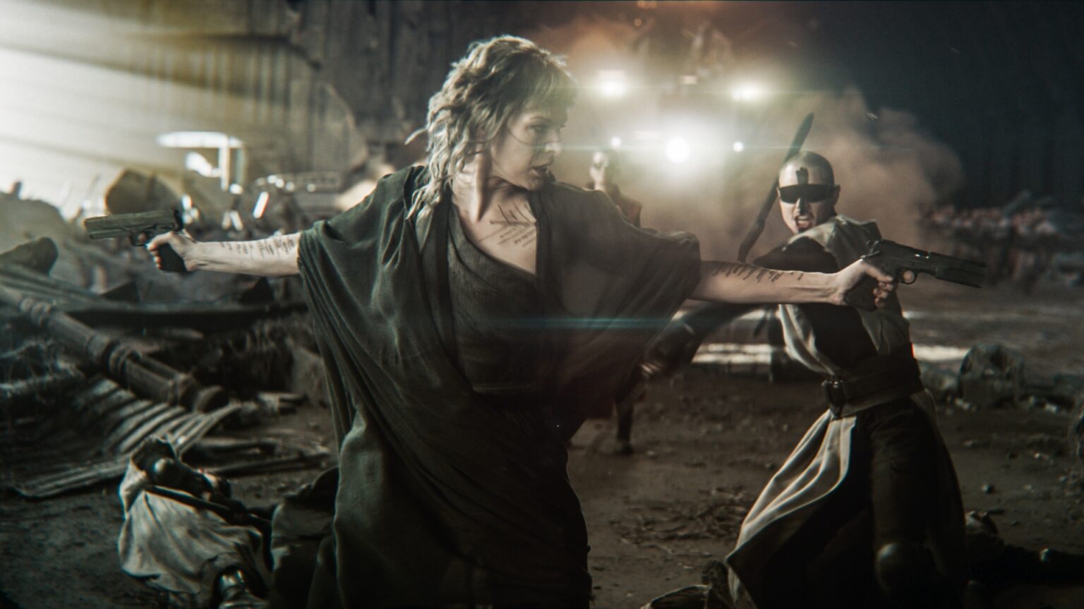 Milla Jovovich exalta trabalho do marido em Nas Terras Perdidas Milla Jovovich como Gray Alys em Nas Terras Perdidas (Reprodução / Diamond Films)