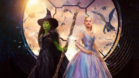 Wicked 2 ganha prévia emocionante com Elphaba e Glinda em destaque Elphaba e Glinda lado a lado em pôster oficial de Wicked: Parte 2, com cenário mágico ao fundo.