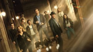Lançamentos da semana: veja o que chega aos cinemas e streamings Elenco do filme Truque de Mestre – O 3º Ato reunido em um cenário luxuoso, com cartas de baralho e truques de ilusão em destaque.